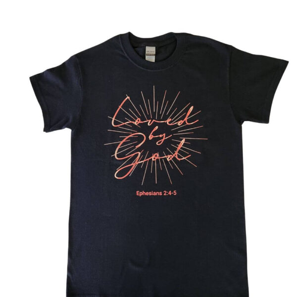 Loved by God women's radiant black t-shirt. The quote is in red script surrounded by a red sunburst. The design features the Bible verse Ephesians 2:4-5.