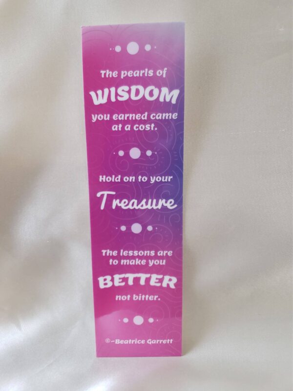 Wisdom Quote laminated Bookmark gradient pink and purple design with small white pearls between the words “wisdom,” “treasure,” and “better features wisdom quote by Beatrice Garrett